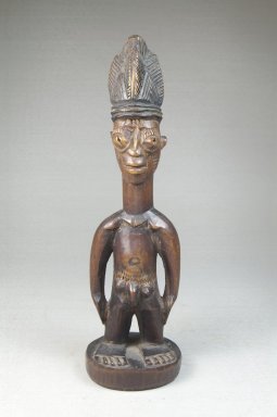 Yorùbá artist. <em>Figure of a Standing Male (Ere Ibeji)</em>, late 19th or early 20th century. Wood, 10 1/2 in. (24.5 x 7 cm). Brooklyn Museum, Robert B. Woodward Memorial Fund, 22.1459. Creative Commons-BY (Photo: Brooklyn Museum, CUR.22.1459_front_PS5.jpg)