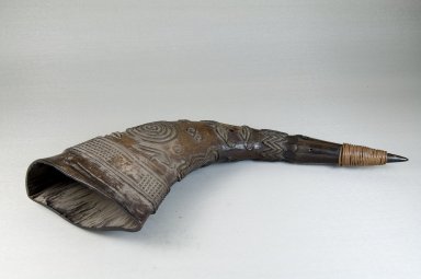 Kuba (Bushoong subgroup). <em>Carved Horn Buffalo Drinking Cup</em>, early 20th century. Buffalo horn, copper, 14 3/16 x 4 15/16 in. (36 x 12.5 cm). Brooklyn Museum, Museum Expedition 1922, Robert B. Woodward Memorial Fund, 22.1482. Creative Commons-BY (Photo: Brooklyn Museum, CUR.22.1482_front_PS5.jpg)