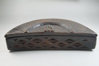 Kuba (Bushoong subgroup). <em>Cosmetic Box</em>, late 19th or early 20th century. Wood, 11 7/16 x 4 3/4in. (29 x 12cm). Brooklyn Museum, Museum Expedition 1922, Robert B. Woodward Memorial Fund, 22.1483a-b. Creative Commons-BY (Photo: Brooklyn Museum, CUR.22.1483a-b_front_PS5.jpg)