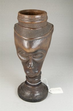 Kuba (Bushoong subgroup). <em>Single Head Goblet (Mbwoongntey)</em>, early 20th century. Wood, 8 1/4 x 4 5/16 in. (21 x 11 cm). Brooklyn Museum, Museum Expedition 1922, Robert B. Woodward Memorial Fund, 22.1486. Creative Commons-BY (Photo: Brooklyn Museum, CUR.22.1486_front_PS5.jpg)