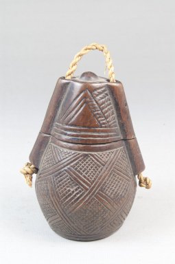 Kamba Kongo. <em>Powder Box (Tutukipfula)</em>, late 19th-early 20th century. Wood, fiber, height: 4 in. (10.2 cm); diameter: 2 1/2 in. (6.4 cm). Brooklyn Museum, Museum Expedition 1922, Robert B. Woodward Memorial Fund, 22.150a-b. Creative Commons-BY (Photo: Brooklyn Museum, CUR.22.150_front_PS5.jpg)
