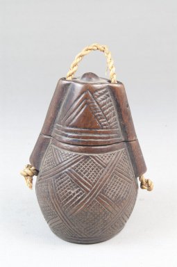 Kamba Kongo. <em>Powder Box (Tutukipfula)</em>, late 19th–early 20th century. Wood, fiber, height: 4 in. (10.2 cm); diameter: 2 1/2 in. (6.4 cm). Brooklyn Museum, Museum Expedition 1922, Robert B. Woodward Memorial Fund, 22.150a-b. Creative Commons-BY (Photo: Brooklyn Museum, CUR.22.150_front_PS5.jpg)