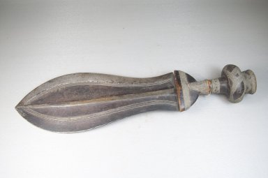Kuba (Bushoong subgroup). <em>Knife (Ikul)</em>, late 19th or early 20th century. Iron, wood, wire, 3 15/16 x 14 3/16 in. (10 x 36 cm). Brooklyn Museum, Museum Expedition 1922, Robert B. Woodward Memorial Fund, 22.1521. Creative Commons-BY (Photo: Brooklyn Museum, CUR.22.1521_side_PS5.jpg)