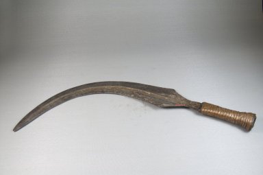 Ngbandi. <em>Dagger</em>, 19th century. Iron, wood, copper alloy strips, Base: 7 1/16 x 18 1/8 in. (18 x 46 cm). Brooklyn Museum, Museum Expedition 1922, Robert B. Woodward Memorial Fund, 22.1567. Creative Commons-BY (Photo: Brooklyn Museum, CUR.22.1567_side_PS5.jpg)