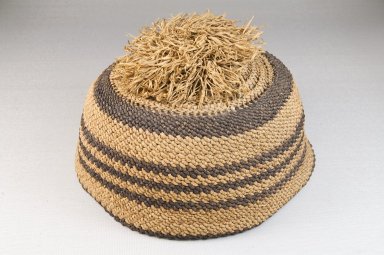 Kongo. <em>Basketry Cap</em>, late 19th century. Raffia vegetal fiber, height: 2 3/4 in. (7 cm); diameter: 6 1/4 in. (15.9 cm). Brooklyn Museum, Brooklyn Museum Collection, 22.1606. Creative Commons-BY (Photo: Brooklyn Museum, CUR.22.1606_front_PS5.jpg)
