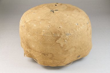 Swahili. <em>Cap (Kofia ya Kiua)</em>, late 19th century. Cotton cloth, thread, height: 3 3/4 in. (9.5 cm); diameter: 7 in. (17.8 cm). Brooklyn Museum, Museum Expedition 1922, Robert B. Woodward Memorial Fund, 22.1608. Creative Commons-BY (Photo: Brooklyn Museum, CUR.22.1608_front_PS5.jpg)
