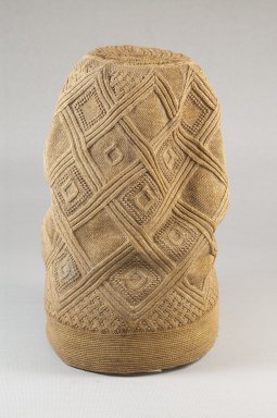 Kongo. <em>Hat (Mpu)</em>, late 19th century. Fiber, 9 x 5 1/8 x 5 1/8 in.  (22.9 x 13.0 x 13.0 cm). Brooklyn Museum, Brooklyn Museum Collection, 22.1610. Creative Commons-BY (Photo: Brooklyn Museum, CUR.22.1610_front_PS5.jpg)