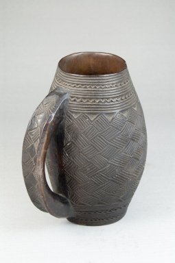 Kuba. <em>Cup</em>, early 20th century. Wood, 5 1/4 x 3 1/2 in. (13.3 x 8.9 cm). Brooklyn Museum, Robert B. Woodward Memorial Fund, 22.161. Creative Commons-BY (Photo: Brooklyn Museum, CUR.22.161_front_PS5.jpg)