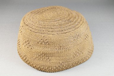 Kongo. <em>Basketry Cap</em>, late 19th or early 20th century. Raffia, height: 3 1/8 in. (7.9 cm); diameter: 6 in. (15.2 cm). Brooklyn Museum, Brooklyn Museum Collection, 22.1626. Creative Commons-BY (Photo: Brooklyn Museum, CUR.22.1626_front_PS5.jpg)