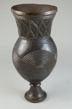 Wongo. <em>Goblet</em>, early 20th century. Wood, 8 1/4 x 3 11/16 x 3 11/16 in. (21 x 9.4 x 9.4 cm). Brooklyn Museum, Museum Expedition 1922, Robert B. Woodward Memorial Fund, 22.175. Creative Commons-BY (Photo: Brooklyn Museum, CUR.22.175_front_PS5.jpg)