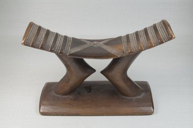 Kuba. <em>Headrest</em>, late 19th or early 20th century. Wood, 6 7/8 x 9 3/4 x 3 7/8 in. (17.5 x 24.8 x 9.8 cm). Brooklyn Museum, Museum Expedition 1922, Robert B. Woodward Memorial Fund, 22.178. Creative Commons-BY (Photo: Brooklyn Museum, CUR.22.178_front_PS5.jpg)