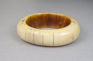 <em>Bracelet</em>. Ivory, height: 1 1/16 in. (2.7 cm); diameter: 3 3/4 in. (9.5 cm). Brooklyn Museum, Museum Expedition 1922, Robert B. Woodward Memorial Fund, 22.1941. Creative Commons-BY (Photo: Brooklyn Museum, CUR.22.1941_front_PS5.jpg)