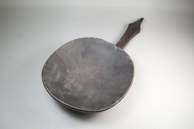  <em>Dish</em>, late 19th century. wood,  chipped and abraded, 8 1/16 x 2 1/2 x 16 3/4 in. (20.4 x 6.4 x 42.5 cm). Brooklyn Museum, Museum Expedition 1922, Robert B. Woodward Memorial Fund, 22.215. Creative Commons-BY (Photo: Brooklyn Museum, CUR.22.215_threequarter_PS5.jpg)