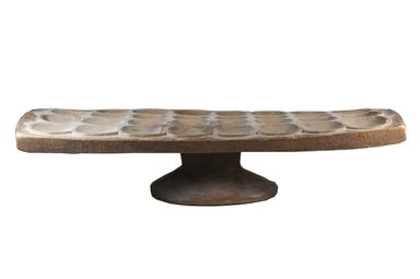  <em>Mancala Game Board</em>, late 19th century. Wood, 5 1/8 x 24 3/4 x 11 in. (13 x 62.9 x 27.9 cm). Brooklyn Museum, Museum Expedition 1922, Robert B. Woodward Memorial Fund, 22.220. Creative Commons-BY (Photo: Brooklyn Museum, CUR.22.220_front_PS5.jpg)