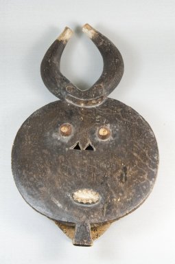 Baule. <em>Mask (Kple-Kple)</em>, 19th century. Wood, pigment, 2 1/2 x 9 x 17 in. (6.4 x 22.9 x 43.2 cm). Brooklyn Museum, Museum Expedition 1922, Robert B. Woodward Memorial Fund, 22.223. Creative Commons-BY (Photo: Brooklyn Museum, CUR.22.223_front_PS5.jpg)