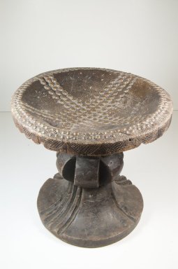 Mangbetu. <em>Stool</em>, late 19th or early 20th century. Wood, copper alloy, 11 13/16 x 12 3/16 x 12 3/16 in. (30 x 31 x 31 cm). Brooklyn Museum, Museum Expedition 1922, Robert B. Woodward Memorial Fund, 22.232. Creative Commons-BY (Photo: Brooklyn Museum, CUR.22.232_front_PS5.jpg)