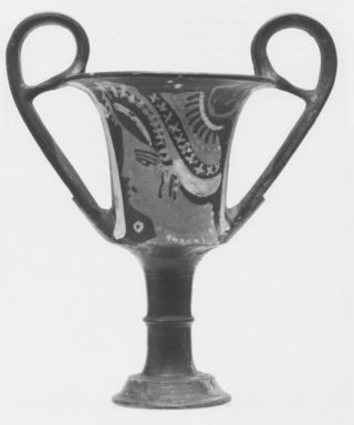 Attributed to Kantharos Group. <em>Red-Figure Kantharos</em>, ca. 325–300 B.C.E. Clay, slip, 6 7/8 x greatest diam. 6 13/16 in. (17.4 x 17.3 cm). Brooklyn Museum, Gift of Mrs. Frederic H. Betts, 22.30. Creative Commons-BY (Photo: Brooklyn Museum, CUR.22.30_NegA_print_bw.jpg)