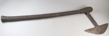Possibly Shona. <em>Axe</em>, 19th century. Armor, 8 1/16 x 22 7/16 in. (20.5 x 57 cm). Brooklyn Museum, Gift of Thomas A. Eddy, 22.339. Creative Commons-BY (Photo: Brooklyn Museum, CUR.22.339_threequarter_PS5.jpg)