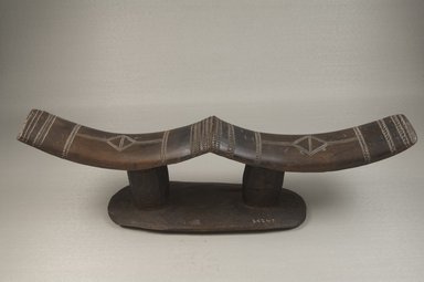 Kuba. <em>Double Headrest</em>, late 19th or early 20th century. Wood, 4 5/8 x 15 5/8 x 3 1/4 in. (11.7 x 39.7 x 8.3 cm). Brooklyn Museum, Museum Expedition 1922, Robert B. Woodward Memorial Fund, 22.372. Creative Commons-BY (Photo: Brooklyn Museum, CUR.22.372_front_PS5.jpg)