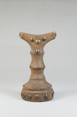 Luba. <em>Headrest</em>, late 19th-early 20th century. Wood, metal, 6 x 3 1/8 x 1 1/2 in. (15.2 x 7.9 x 3.8 cm). Brooklyn Museum, Museum Expedition 1922, Robert B. Woodward Memorial Fund, 22.373. Creative Commons-BY (Photo: Brooklyn Museum, CUR.22.373_front_PS5.jpg)