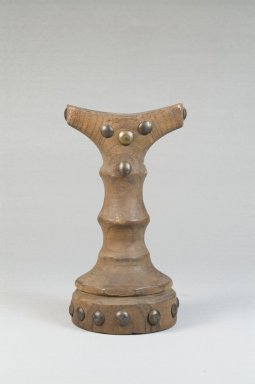 Luba. <em>Headrest</em>, late 19th–early 20th century. Wood, metal, 6 x 3 1/8 x 1 1/2 in. (15.2 x 7.9 x 3.8 cm). Brooklyn Museum, Museum Expedition 1922, Robert B. Woodward Memorial Fund, 22.373. Creative Commons-BY (Photo: Brooklyn Museum, CUR.22.373_front_PS5.jpg)