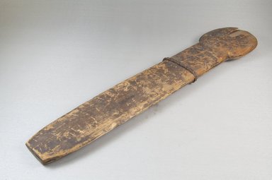 Yaka. <em>Scabbard</em>, late 19th-early 20th century. Wood, animal hide, vegetal fiber, 3 1/2 x 17 in. (8.9 x 43.2 cm). Brooklyn Museum, Museum Expedition 1922, Robert B. Woodward Memorial Fund, 22.391. Creative Commons-BY (Photo: Brooklyn Museum, CUR.22.391_threequarter_PS5.jpg)