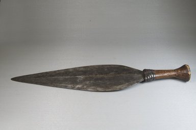 Buaka or. <em>Knife</em>, 19th century. Iron, wood, 4 1/16 x 18 1/8 in. (10.3 x 46 cm). Brooklyn Museum, Museum Expedition 1922, Robert B. Woodward Memorial Fund, 22.405. Creative Commons-BY (Photo: Brooklyn Museum, CUR.22.405_side_PS5.jpg)