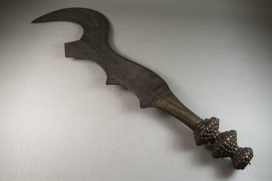 Ngala. <em>Executioner's Sword</em>, late 19th or early 20th century. Iron, wood, metal wire and nailheads, 5 1/8 x 21 7/16 in. (13 x 54.5 cm). Brooklyn Museum, Museum Expedition 1922, Robert B. Woodward Memorial Fund, 22.414. Creative Commons-BY (Photo: Brooklyn Museum, CUR.22.414_threequarter_PS5.jpg)