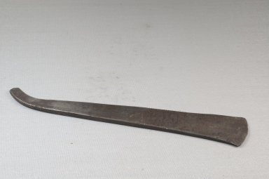 Kuba (Bushoong subgroup). <em>Axe Blade</em>, late 19th century. Iron, 1 3/4 x 9 1/16 in. (4.5 x 23 cm). Brooklyn Museum, Museum Expedition 1922, Robert B. Woodward Memorial Fund, 22.420.1. Creative Commons-BY (Photo: Brooklyn Museum, CUR.22.420.1_front_PS5.jpg)