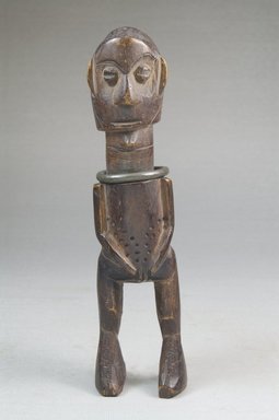 Ngbaka. <em>Figure of Standing Female</em>, 19th-early 20th century. Wood, iron, 6 3/4 x 1 3/4 x 1 3/4 in. (17.1 x 4.4 x 4.4 cm). Brooklyn Museum, Museum Expedition 1922, Robert B. Woodward Memorial Fund, 22.474. Creative Commons-BY (Photo: Brooklyn Museum, CUR.22.474_front_PS5.jpg)