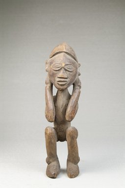 Lulua. <em>Figure of a Man Squatting</em>, late 19th or early 20th century. Wood, 6 1/4 x 1 3/4 x 2 in. (15.9 x 4.4 x 5.1 cm). Brooklyn Museum, Museum Expedition 1922, Robert B. Woodward Memorial Fund, 22.483. Creative Commons-BY (Photo: Brooklyn Museum, CUR.22.483_front_PS5.jpg)