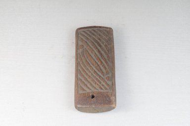 Shona. <em>Divination Die (Hakata)</em>, late 19th or early 20th century. Wood, 5 x 2 1/16 in. (12.7 x 5.3 cm). Brooklyn Museum, Museum Expedition 1922, Robert B. Woodward Memorial Fund, 22.489. Creative Commons-BY (Photo: Brooklyn Museum, CUR.22.489_front_PS5.jpg)