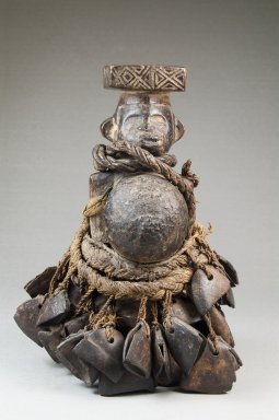 Yombe. <em>Standing Figure with Seed Pods and Beaks of Hornbill</em>, late 19th or early 20th century. Wood, beaks of hornbills, seedpods, string, 6 1/2 x 4 x 3 1/2 in. (16.5 x 10.2 x 8.9 cm). Brooklyn Museum, Museum Expedition 1922, Robert B. Woodward Memorial Fund, 22.497. Creative Commons-BY (Photo: Brooklyn Museum, CUR.22.497_front_PS5.jpg)