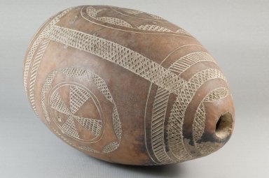  <em>Calabash</em>, before 1922. Gourd, clay, 5 7/8 x 10 1/4 in. (15 x 26 cm). Brooklyn Museum, Museum Expedition 1922, Robert B. Woodward Memorial Fund, 22.509. Creative Commons-BY (Photo: Brooklyn Museum, CUR.22.509_threequarter_PS5.jpg)