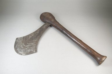 Nsapo-Nsapo. <em>Axe with Handle and Blade</em>, late 19th century. Wood and iron, 10 1/4 x 14 15/16 in. (26 x 38 cm). Brooklyn Museum, Museum Expedition 1922, Robert B. Woodward Memorial Fund, 22.579. Creative Commons-BY (Photo: Brooklyn Museum, CUR.22.579_threequarter_PS5.jpg)