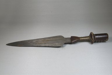 Saka. <em>Dagger with Blade and Handle</em>, late 19th century. Iron, metal wire, wood, 3 1/4 x 18 1/4 in. (8.3 x 46.3 cm). Brooklyn Museum, Museum Expedition 1922, Robert B. Woodward Memorial Fund, 22.582. Creative Commons-BY (Photo: Brooklyn Museum, CUR.22.582_side_PS5.jpg)