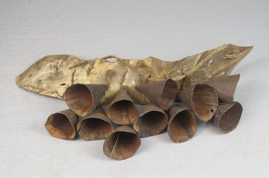  <em>Anklet</em>, before 1922. Rawhide, iron, fiber, 7 1/2 x 2 1/2 in. (19.1 x 6.4 cm). Brooklyn Museum, Museum Expedition 1922, Robert B. Woodward Memorial Fund, 22.660. Creative Commons-BY (Photo: Brooklyn Museum, CUR.22.660_front_PS5.jpg)