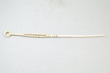 Mangbetu. <em>Hairpin</em>, late 19th or early 20th century. Ivory, pigment, 7 11/16 x 1/2 in. (19.5 x 1.3 cm). Brooklyn Museum, Museum Expedition 1922, Robert B. Woodward Memorial Fund, 22.749. Creative Commons-BY (Photo: Brooklyn Museum, CUR.22.749_side_PS5.jpg)