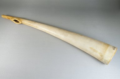  <em>Horn</em>, before 1922. Plain light ivory, 3 1/8 x 22 3/4 in. (8 x 57.8 cm). Brooklyn Museum, Museum Expedition 1922, Robert B. Woodward Memorial Fund, 22.765. Creative Commons-BY (Photo: Brooklyn Museum, CUR.22.765_threequarter_PS5.jpg)