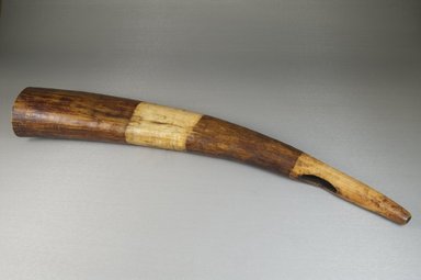  <em>Horn</em>, before 1922. Dark and light ivory, 2 15/16 x 18 1/8 in. (7.5 x 46 cm). Brooklyn Museum, Museum Expedition 1922, Robert B. Woodward Memorial Fund, 22.768. Creative Commons-BY (Photo: Brooklyn Museum, CUR.22.768_front_PS5.jpg)