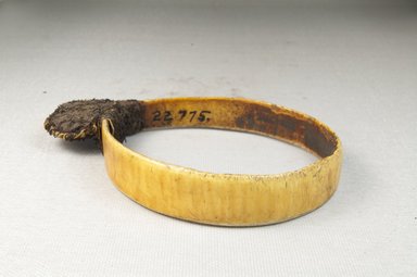  <em>Bracelet, Ornament</em>. Plain ivory, fiber bag Brooklyn Museum, Museum Expedition 1922, Robert B. Woodward Memorial Fund, 22.775. Creative Commons-BY (Photo: Brooklyn Museum, CUR.22.775_front_PS5.jpg)