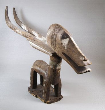 Bamana. <em>Dance Headdres (Ci-wara Kun)</em>, late 19th or early 20th century. Wood, iron, paint, 13 x 27 1/4 x 4 1/4 in. (33.0 x 70.0 x 11.0 cm). Brooklyn Museum, Museum Expedition 1922, Robert B. Woodward Memorial Fund, 22.7. Creative Commons-BY (Photo: Brooklyn Museum, CUR.22.7_threequarter_PS5.jpg)