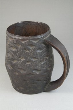 Kuba. <em>Cup</em>, late 19th or early 20th century. Wood, 6 3/4 x 3 3/8 x 3 3/8 in. (17.1 x 8.6 x 8.6 cm). Brooklyn Museum, Museum Expedition 1922, Robert B. Woodward Memorial Fund, 22.800. Creative Commons-BY (Photo: Brooklyn Museum, CUR.22.800_front_PS5.jpg)