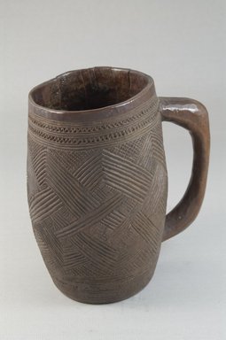 Kuba. <em>Cup</em>, early 20th century. Wood, height: 5 11/16 in. (14.5 cm); diameter: 3 3/8 in. (8.6 cm). Brooklyn Museum, Museum Expedition 1922, Robert B. Woodward Memorial Fund, 22.803. Creative Commons-BY (Photo: Brooklyn Museum, CUR.22.803_front_PS5.jpg)