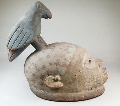 Yorùbá. <em>Gelede Mask with Bird on Head</em>, late 19th or early 20th century. Wood, pigment, 13 3/4 x 9 x 15 1/2 in. (34.9 x 22.9 x 39.4 cm). Brooklyn Museum, Museum Expedition 1922, Robert B. Woodward Memorial Fund, 22.821. Creative Commons-BY (Photo: Brooklyn Museum, CUR.22.821_side_PS5.jpg)