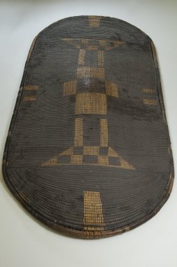 Zande. <em>Shield</em>, late 19th century. Fiber, wood, 46 7/8 x 22 1/16 in. (119.1 x 56 cm). Brooklyn Museum, Museum Expedition 1922, Robert B. Woodward Memorial Fund, 22.856. Creative Commons-BY (Photo: Brooklyn Museum, CUR.22.856_front_PS5.jpg)