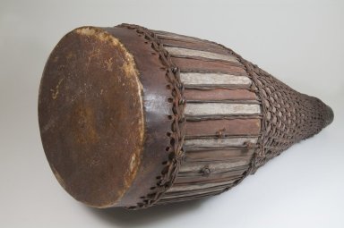  <em>Drum</em>, late 19th or early 20th century. Wood, leather, 23 1/4 x 10 1/4 x 10 1/4 in. (59.1 x 26 x 26 cm). Brooklyn Museum, Museum Expedition 1922, Robert B. Woodward Memorial Fund, 22.873. Creative Commons-BY (Photo: Brooklyn Museum, CUR.22.873_front_PS5.jpg)