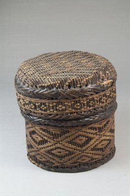 Kongo. <em>Cylindrical Basket with Cover</em>, 19th century. Vegetal fiber, 4 3/8 x 4 3/4 x 4 3/4 in. (11.1 x 12.1 x 12.1 cm). Brooklyn Museum, Museum Expedition 1922, Robert B. Woodward Memorial Fund, 22.878a-b. Creative Commons-BY (Photo: Brooklyn Museum, CUR.22.878a-b_front_PS5.jpg)