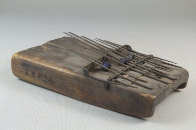  <em>Plucked Idiophone (Sanza)</em>, late 19th or early 20th century. Wood, metal, glass beads, 2 x 6 x 3 1/4 in. (5.1 x 15.2 x 8.3 cm). Brooklyn Museum, Museum Expedition 1922, Robert B. Woodward Memorial Fund, 22.894. Creative Commons-BY (Photo: Brooklyn Museum, CUR.22.894_threequarter_PS5.jpg)