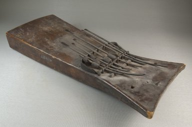  <em>Plucked Idiophone (Sanza)</em>, late 19th or early 20th century. Wood, metal, 3 1/8 x 15 1/8 x 6 1/2 in. (7.9 x 38.4 x 16.5 cm). Brooklyn Museum, Museum Expedition 1922, Robert B. Woodward Memorial Fund, 22.895. Creative Commons-BY (Photo: Brooklyn Museum, CUR.22.895_threequarter_PS5.jpg)